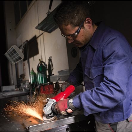 Polizor unghiular 125 mm 1200 W cu mâner anti-vibrații Milwaukee AGV12-125X, cod 4933428085