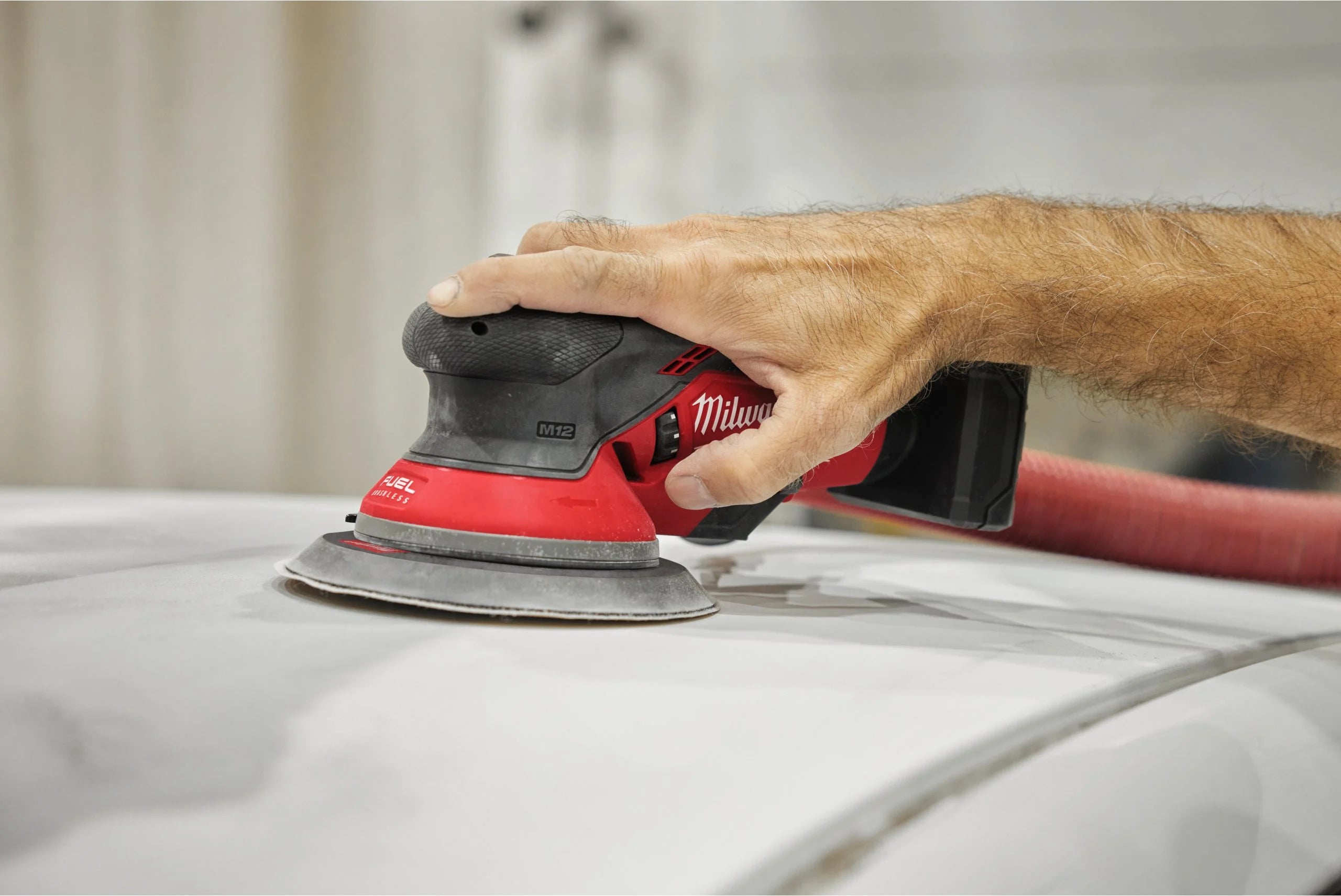 Șlefuitor orbital Milwaukee M12 FROS5-0, 150 mm cu orbită de 5.0 mm, cod 4933493650