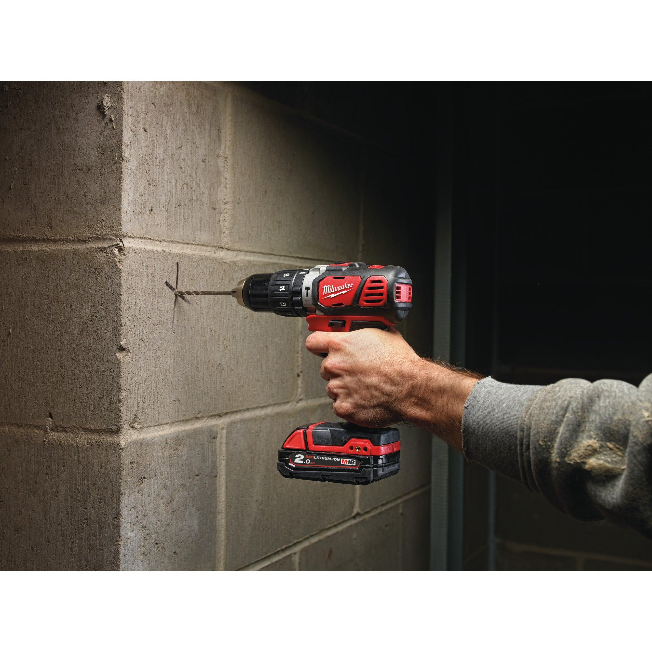 Mașină de găurit cu percuție compactă M18™ Milwaukee M18BPD-202C, cod 4933443515, 2 x M18 B2 acumulator, M12-18 C încărcător, cutie plastic - BIG STORE (Dynamic Tools SRL)