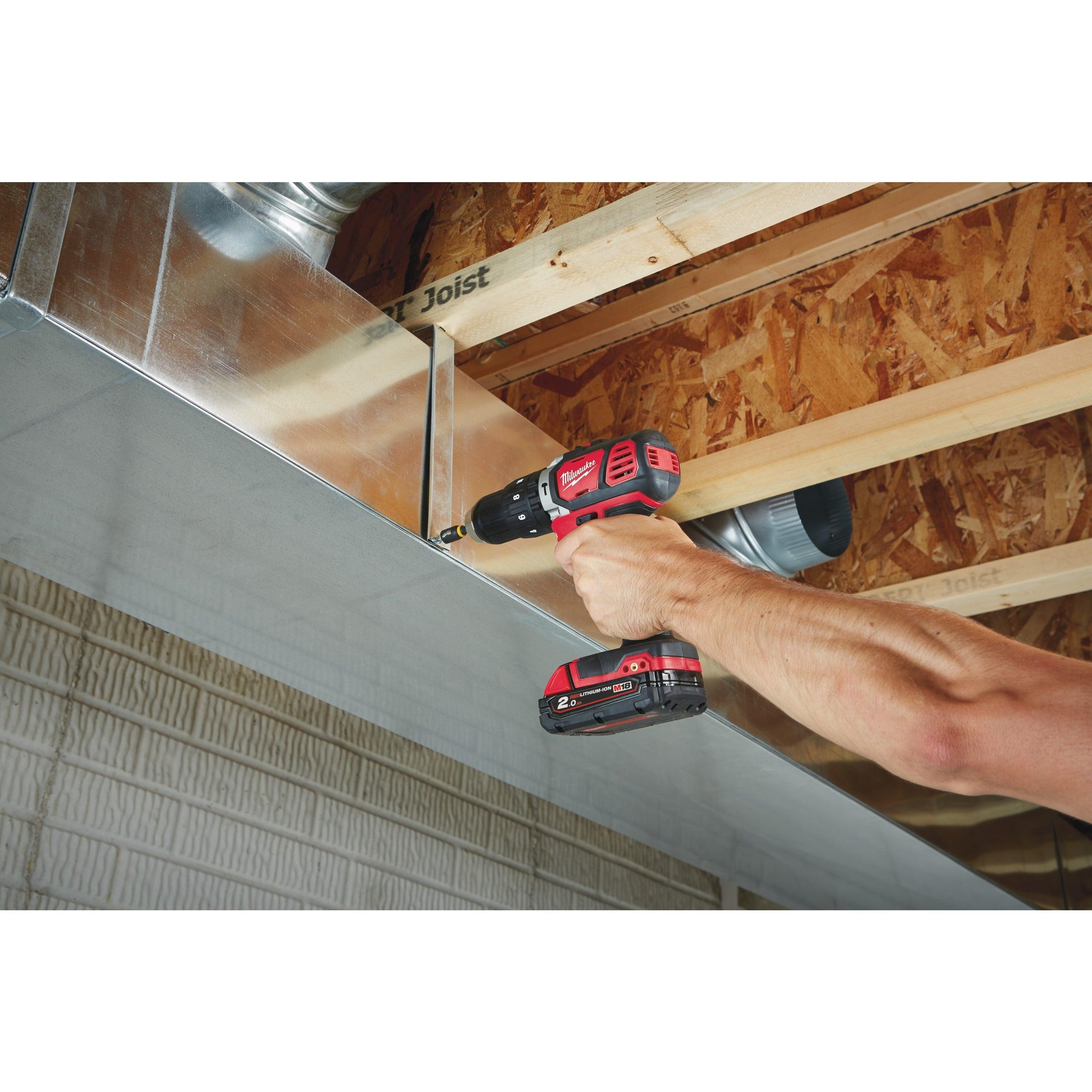 Mașină de găurit cu percuție compactă M18™ Milwaukee M18BPD-202C, cod 4933443515, 2 x M18 B2 acumulator, M12-18 C încărcător, cutie plastic - BIG STORE (Dynamic Tools SRL)