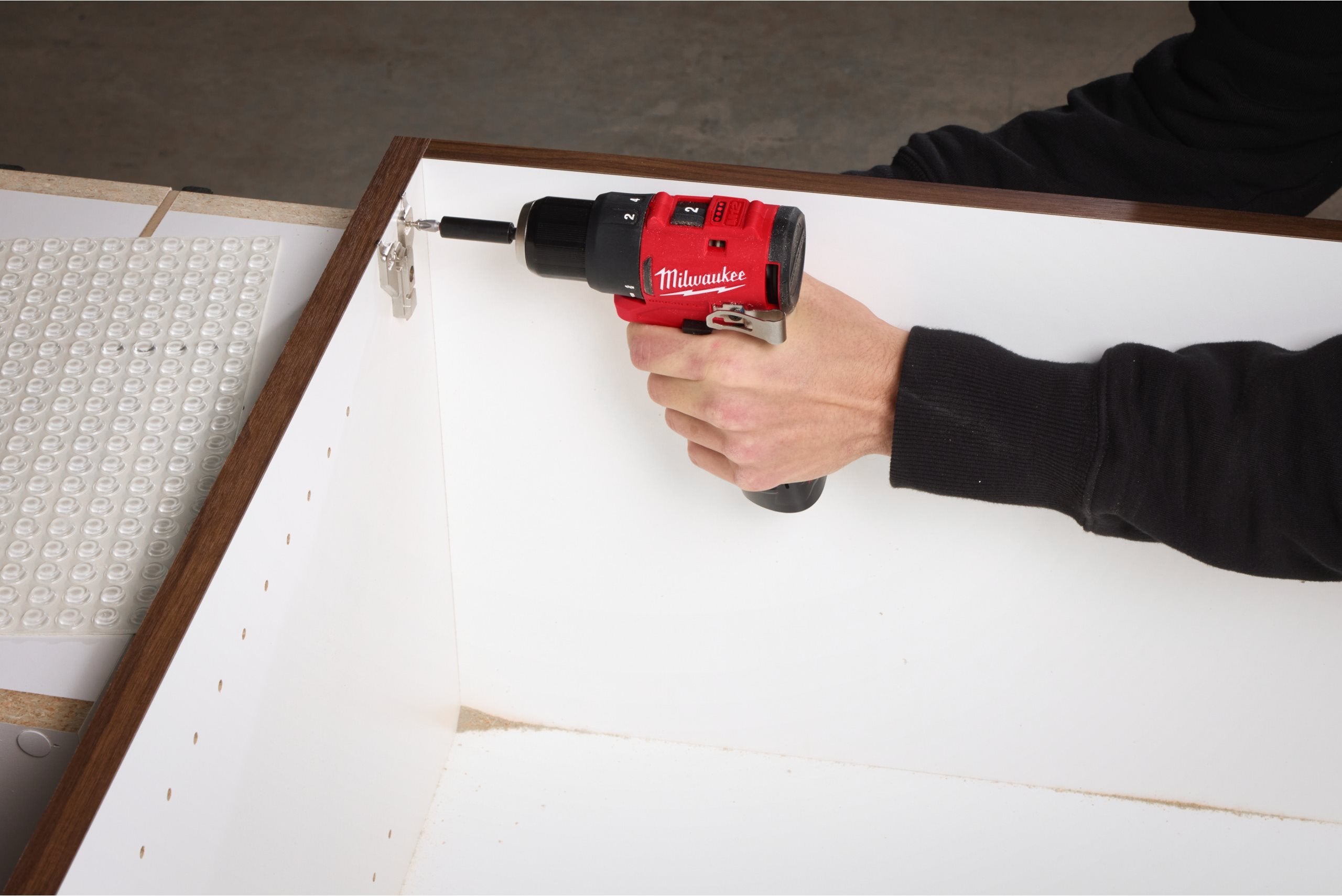 Mașină de găurit compactă Milwaukee M12 BLPDRC, cu percuție și motor fără perii